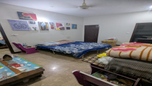 Ideal Investment: Building with 2 Shops & 3 Apartments – Saadi Town Block 3